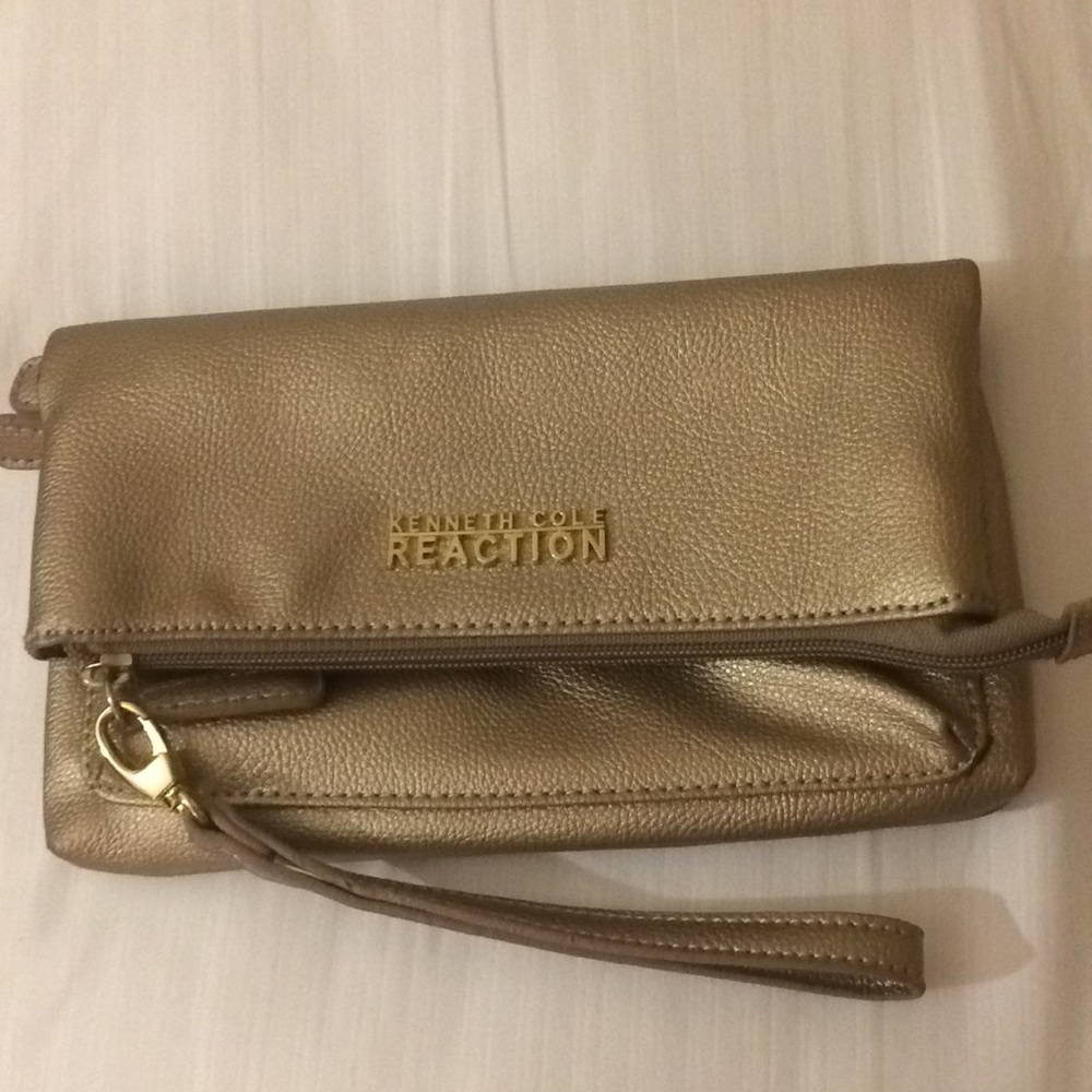 Kenneth Cole Reaction shimmery gold wristlet/bag